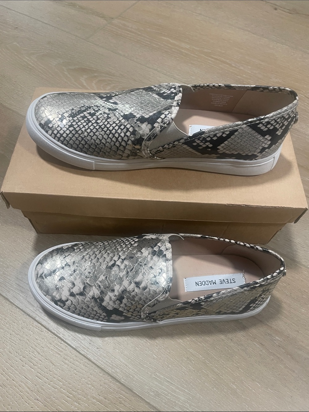 Steve Madden Slip-On Sneakers in Black and Metallic Cream Snake-Print